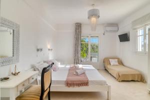 Posteľ alebo postele v izbe v ubytovaní Dahlia Apartments And Studios