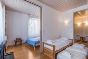 Ένα ή περισσότερα κρεβάτια σε δωμάτιο στο Appartement du Mont - Résidence La Vardaffe - Welkeys