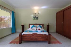 Letto o letti in una camera di Coco Blanche