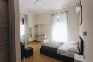 Postel nebo postele na pokoji v ubytování THE NEST - B&B - Suites