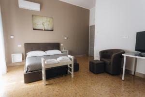 TV a/nebo společenská místnost v ubytování THE NEST - B&B - Suites