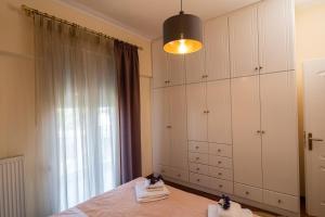Posteľ alebo postele v izbe v ubytovaní Mouzakiaris Home Meteora View