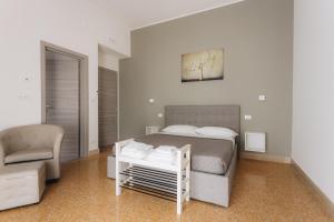 Posteľ alebo postele v izbe v ubytovaní THE NEST - B&B - Suites + 32 fotografií