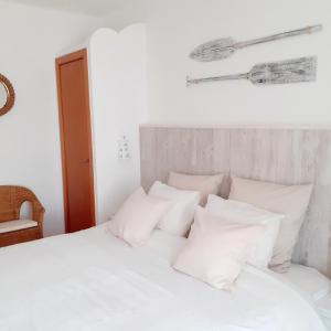 מיטה או מיטות בחדר ב-Casa Ocean