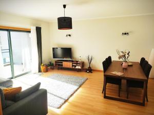 TV a/nebo společenská místnost v ubytování Apartamento Marina Olhão