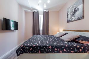 Postel nebo postele na pokoji v ubytování Apartment Glory