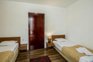 Postel nebo postele na pokoji v ubytování Elegant Lux Hotel + 37 fotografií