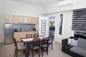 Kuchyň nebo kuchyňský kout v ubytování Giotis apartments