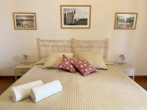 A bed or beds in a room at B&B Evelyne
