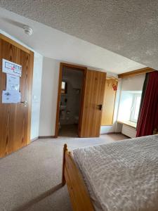 Posteľ alebo postele v izbe v ubytovaní Hotel Bernina Hospiz