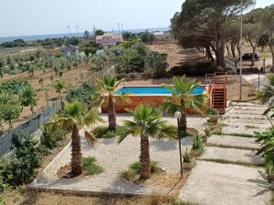 Bazén v ubytovaní Turtle Island Apartments alebo v jeho blízkosti
