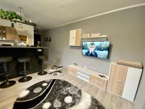 Kuchyňa alebo kuchynka v ubytovaní T&T Apartman