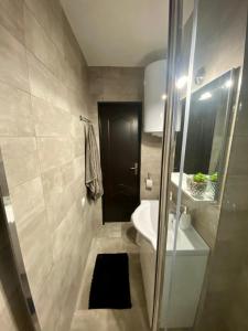 Kúpeľňa v ubytovaní T&T Apartman