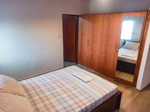 Llit o llits en una habitació de Appartement F4 Climatisé niveau Etage à Totsi près de la maison ADEBAYOR