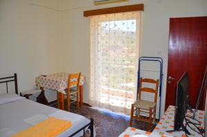A bed or beds in a room at Vai Rent Rooms