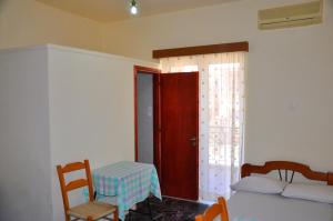 A bed or beds in a room at Vai Rent Rooms