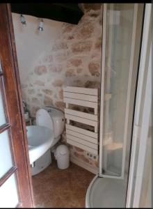Ванная комната в Le charme de la pierre