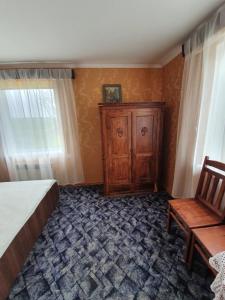 Postel nebo postele na pokoji v ubytování Ēmužas