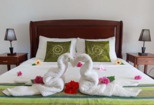 Letto o letti in una camera di Coco Blanche