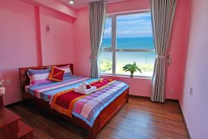Giường trong phòng chung tại Khách sạn Bạch Mai Vũng Tàu - Bach Mai Vung Tau hotel