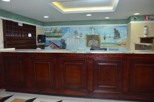 a large lobby with a large mural on the wall at Maicao Internacional in Maicao