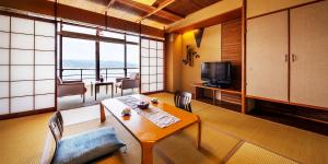 Televiisor ja/või meelelahutuskeskus majutusasutuses Manpa Resort