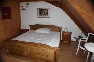 Postel nebo postele na pokoji v ubytování Hotel Das Landhaus