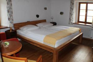 Postel nebo postele na pokoji v ubytování Hotel Das Landhaus