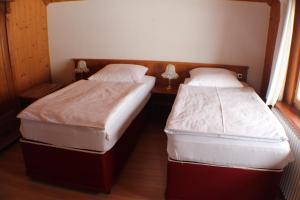 Postel nebo postele na pokoji v ubytování Hotel Das Landhaus