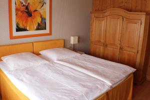 Postel nebo postele na pokoji v ubytování Hotel Das Landhaus