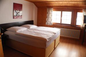 Postel nebo postele na pokoji v ubytování Hotel Das Landhaus