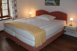 Postel nebo postele na pokoji v ubytování Hotel Das Landhaus