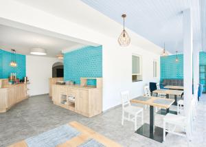 TV a/nebo společenská místnost v ubytování Lorelei Pension Adults Only