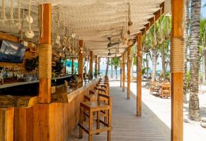 Mayan Monkey Isla Mujeres tesisinde bir restoran veya yemek mekanı