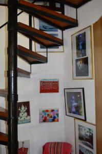 a room with wooden shelves and pictures on the wall at Macedonia, Accommodations,rentals"Villa Vevcani" Vevchani in Vevčani