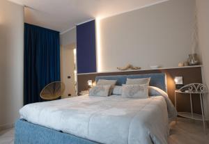 Кровать или кровати в номере Appartamenti Da Paulin