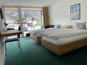 Cama o camas de una habitación en Hotel Hahnenblick