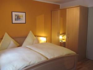Кровать или кровати в номере Haus Moderegger