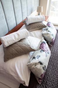 
Łóżko lub łóżka w pokoju w obiekcie Dom Wypoczynkowy Małgosia
