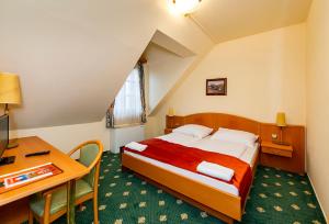 Postel nebo postele na pokoji v ubytování Gastland M0 Hotel & Conference Center