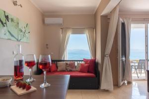 A seating area at Galini Beach Studios and Penthouse