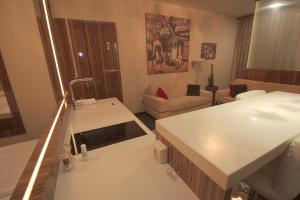 Łóżko lub łóżka w pokoju w obiekcie Hotel Vadászkürt Superior