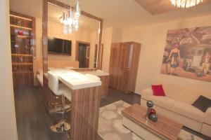 Telewizja i/lub zestaw kina domowego w obiekcie Hotel Vadászkürt Superior