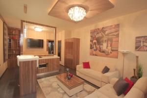 Telewizja i/lub zestaw kina domowego w obiekcie Hotel Vadászkürt Superior