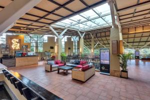 Posezení v ubytování Club Mahindra Virajpet, Coorg