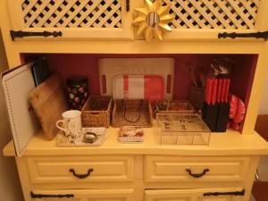 a cabinet with many items on top of it at Chez'Artistes in Argelès-sur-Mer +10 photos