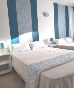 Ένα ή περισσότερα κρεβάτια σε δωμάτιο στο Apartment near to the ocean in touristic center zone