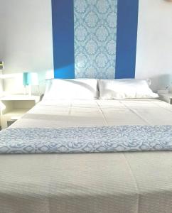 Ένα ή περισσότερα κρεβάτια σε δωμάτιο στο Apartment near to the ocean in touristic center zone