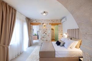 Ένα ή περισσότερα κρεβάτια σε δωμάτιο στο CASA GIORGIO EXCLUSIVE SUITES +39 φωτογραφίες