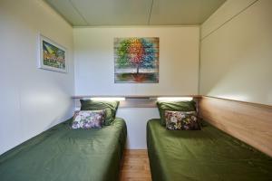 Posteľ alebo postele v izbe v ubytovaní VINEA PANONIKA wine & mind retreat